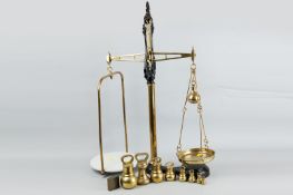 An excellent set of Victorian brass and cast iron beam scales, marked 'Class C to Weigh 7lbs'