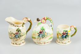 Three Crown Devon ware pieces titled 'Daisy Bell', musical jug with musical box, a moon shaped