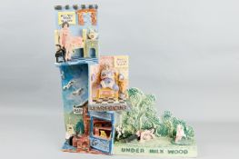 A large sculpture by Carl Hodgson depicting scenes from Dylan Thomas' 'Under Milk Wood', multi-