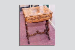 A Victorian figured walnut work table, the quarter veneered top with piecrust moulded edge,