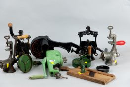 Eight various cast iron spong and other slicers, cutters and mincers with worktop fixings and a