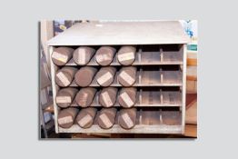 A painted wooden twenty four section plan cabinet with sixteen tin lidded tubular plan holders, 22