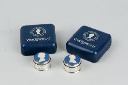A pair of cased silver circular pill boxes, limited edition each bearing respectively in blue Jasper