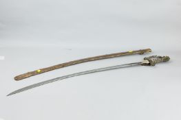 A Georgian (CORRECTION 19TH century) cavalry sabre and metal sheath, the blade with gilt decorated