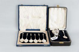 A cased set of six silver teaspoons, twist and feather topped handles, 2 ozs, Birmingham 1894 and