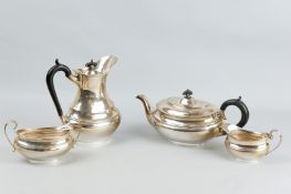 A four piece silver tea and coffee service, each piece of oval stepped form with tiny incised banded