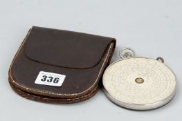 A Fowler Twelve Ten calculator in a leather case, circa 1936