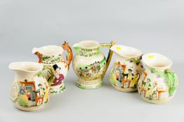 Five Crown Devon musical jugs with musical boxes, one titled 'Widecombe Fair', a 'John Peel' fox