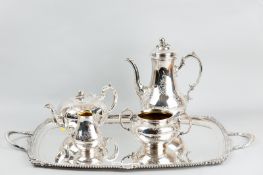 An electroplated four piece bright cut tea and coffee service with a matching heavy oblong twin