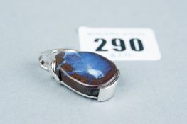 A sterling silver pendant with freeform boulder opal accompanied by US valuation card, 9.4 grms