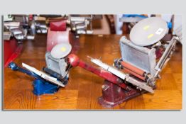 An Adana 6 x 4 hand operated printing press and a small Adana hand operated card printing press