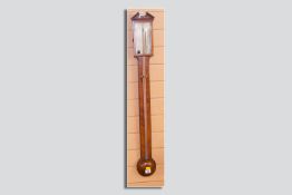 A Georgian mahogany and boxwood inlaid stick barometer, the silvered dial marked 'Vechio & Co,