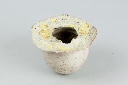 A Beverley Bell-Hughes pot in a white stipple glaze with feature yellow splashed rim, unmarked, 3.25