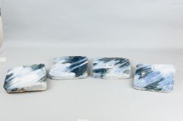 A four piece sculpture by Bronwyn Williams Ellis titled 'Storm Force 1, 2, 3 and 4' each piece being