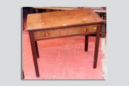 A 19th Century oblong topped mahogany side table of fine colour with a single long drawer having