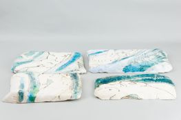 A four piece kiln fired ceramic sculpture by Bronwyn Williams Ellis titled 'Swimmer 5, 7, 9 and 10',