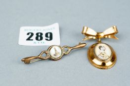 An oval gold plated portrait brooch with bow by T L Mott of Birmingham and a nine carat and mother