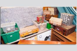 A quantity of trays, crates and boxes containing masses of lead type and block prints, various