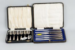A cased set of six silver cake forks, 3 ozs, Sheffield 1939 and a cased set of six silver handled