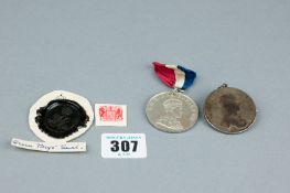 A ribboned white metal medal commemorating the Coronation of King Edward VIII, 12th May 1937, a