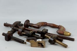 Five brass and hardwood marking gauges and one other, a brass bull-nosed carpenter's plane with