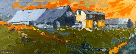 20th CENTURY WELSH SCHOOL oil on board - farmstead in a sunset sky, indistinctly signed, 11.5 x 29.5