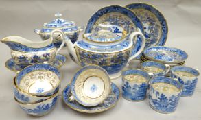 An extensive early nineteenth century blue and white Willow pattern part tea-service, probably Miles