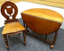 A mahogany shield-back hall-chair together with a mahogany Sutherland tea-table on twist supports