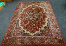 A good Belgian pure wool carpet with intricate Persian patterns in blue and rust, 99 x 134 ins (