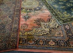 Three large sundry patterned Beligan wool-pile carpets (some fading and cleaning required), the