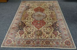 An intricately patterned Persian wool carpet with grey reserve, 120 x 79 ins (306 x 210 cms)