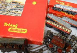 A mixed lot of Hornby Triang and pre-war Hornby Meccano tin-plate O-gauge railway including part-