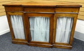 A William IV rosewood break-front chiffonier with three single-pane arched windows to the doors of