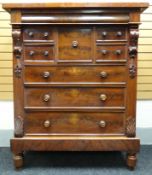 A Victorian mahogany Scottish-style chest of drawers. The drawers in an arrangement of three