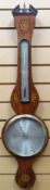 An early nineteenth century Sheraton-style painted rosewood and inlaid banjo-barometer with silvered