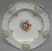 A Royal Worcester white-ground dish having a painted flower posy to the interior and with unusual
