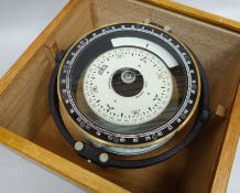 A cased maritime pivoting compass by Nunotani Keiki Seisakusho Co Ltd of Amagasaki, Japan, 10 in