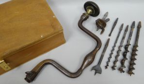 A Victorian iron cabinet-maker's brace by James Howarth of Sheffield, having a brass and ebonised