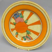 A Clarice Cliff 'Cafe-Au-Lait' display plate in bright orange and yellow glaze, 9 ins diam (23 cms)