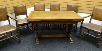 An oak refectory table and six chairs. Comprising excellent twentieth century reproduction of a