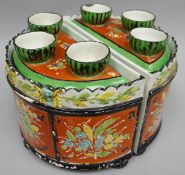 A pair of early nineteenth century half-moon pearlware bough pots, both naively painted with three