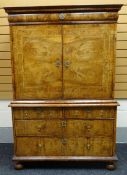 A fine quality Queen Anne period walnut cabinet-on-chest having a base of two long and two short