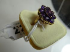 A 9ct yellow gold amethyst cluster ring