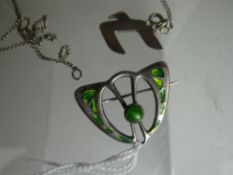 A Charles Horner Art Nouveau silver and enamel abstract pendant, 4.7gms and another pendant with
