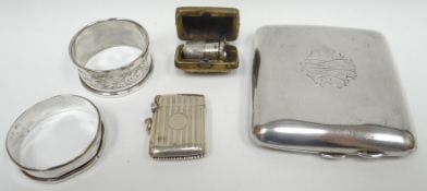 A parcel of silver items comprising cigarette case, machine-turned silver vesta, a silver thimble in