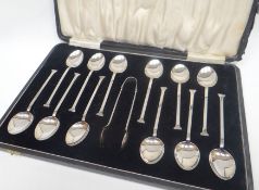 A cased set of twelve spade-handled coffee spoons with tongs, Birmingham 1936, 4.4ozs