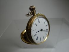 An 18k yellow gold floral engraved ladies pocket-watch, bearing Roman numerals to the white enamel