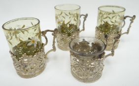 A set of four rococo-style pierced silver punch-glass holders by Bertrand Muller, Chester 1901, 1.