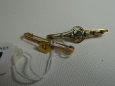 Two yellow gold bar brooches, 15ct and 9ct, total weight 5.2gms
