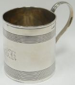 A George III silver mug of slightly tapering form and decorated with stripes, London 1800, 6.5ozs